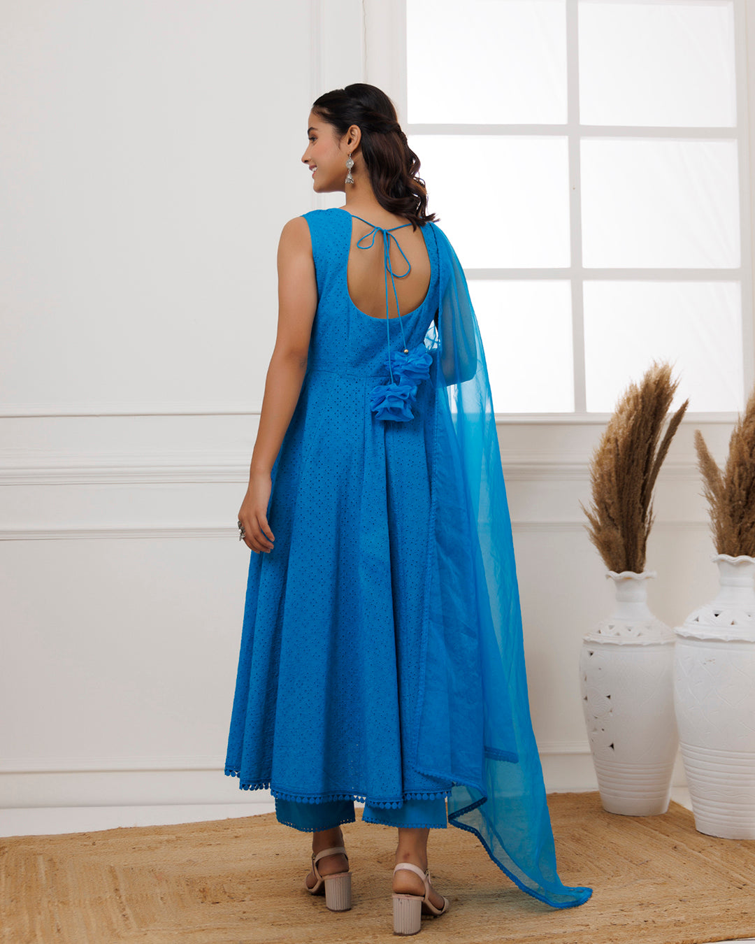 Turquoise Schiffli Sleeveless Anarkali Suit